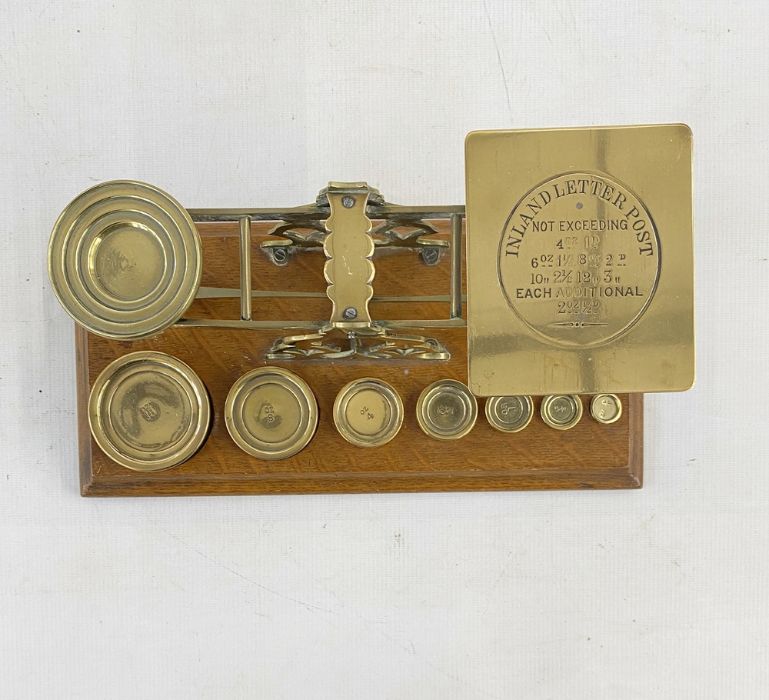 Set of late 19th century Sampson Mordan and Co. postal scales, with seven graduated weights on oak - Image 7 of 10