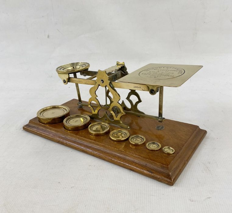 Set of late 19th century Sampson Mordan and Co. postal scales, with seven graduated weights on oak - Image 6 of 10