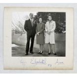 Photograph of Elizabeth II, Prince Philip and Princess Anne, dated '72 and signed in ink