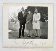 Photograph of Elizabeth II, Prince Philip and Princess Anne, dated '72 and signed in ink