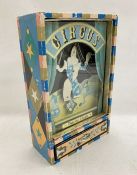 1970's wind-up music box playing 'Send in the Clown' with dancing clown figure, paper covered