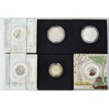 Silver proof collection consisting of six Royal Mint produced coins, two Peter Rabbit enamelled 50p,