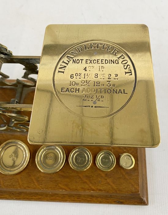 Set of late 19th century Sampson Mordan and Co. postal scales, with seven graduated weights on oak - Image 3 of 10