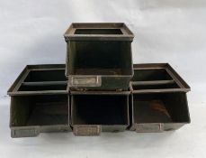 Set of four industrial stacking trays, 74.5cm high total x 21.5cm wide approx.