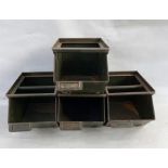 Set of four industrial stacking trays, 74.5cm high total x 21.5cm wide approx.