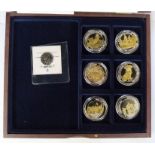 Two presentation wooden boxes comprising six silver plated commemoratives of the Great War and six