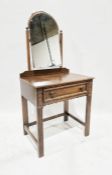 Early 20th century oak dressing table with frieze drawer, carved decoration, on straight supports,