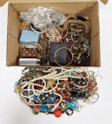 Quantity of costume jewellery to include bangles, beaded necklaces, etc