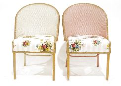 Two Lloyd Loom-style chairs