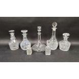 Stuart cut glass decanter and six assorted clear glass decanters and bottles (7)