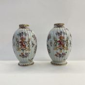 Pair of Samson porcelain vases in pseudo-Chinese style, each ovoid and ribbed, decorated with