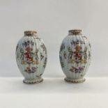 Pair of Samson porcelain vases in pseudo-Chinese style, each ovoid and ribbed, decorated with