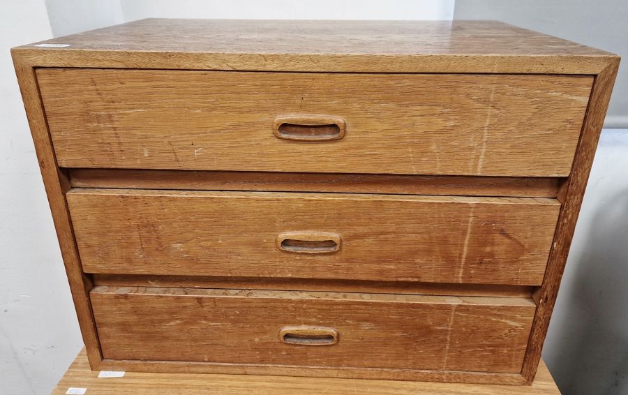 Light oak three-drawer chest, 63.5cm wide