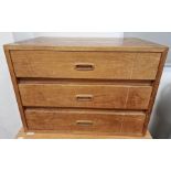 Light oak three-drawer chest, 63.5cm wide