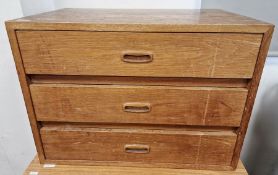 Light oak three-drawer chest, 63.5cm wide