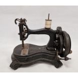Heavy cast iron sewing machine by 'Wheeler(?) and Wilson, London", 29cm high
