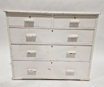 White painted chest of two short and three long drawers, 89cm high x 95cm wide x 51.5cm deep
