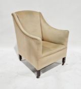 20th century beige upholstered armchair on straight supports and castors