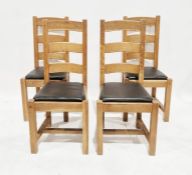Set of four modern oak ladderback kitchen chairs with leather inset seats (4)
