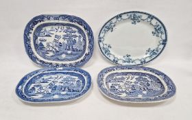 Four assorted meat dishes to include three blue and white willow pattern (4) Condition ReportLight