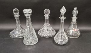 Five assorted clear glass decanters, one with Royal Yacht Squadron flag (5)