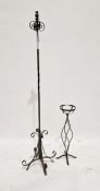 Wrought iron standard lamp, 62.5cm high approx. and a wrought iron jardiniere stand. (2)
