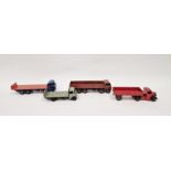 Four vintage Dinky playworn diecast model cars to include Supertoys No.513 Guy Tailboard lorry- grey