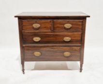 20th century stained oak chest of two short and two long drawers, on turned supports and castors,