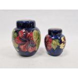 Moorcroft 'Hibiscus' pattern ginger jar, blue ground, signed to base, 20cm high approx. and