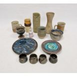 Quantity of studio pottery to include candle holder, various mugs, vases, many marked to base,