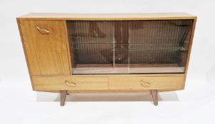 Mid 20th century stained wood and glazed sideboard having cupboard with fall front, glass shelves