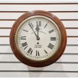 Mahogany cased wall clock, the circular dial with Roman numerals denoting hours, dial marked M.R.C