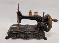 Late 19th century double spooled hand-cranked sewing machine, 28cm high