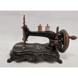 Late 19th century double spooled hand-cranked sewing machine, 28cm high