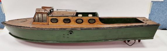 Vintage wooden pond boat with inbuilt electric motor