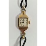 Gold-coloured metal Vertex lady's wristwatch on black leather strap