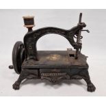 Mid- to late 19th century 'American Registered' sewing machine on heavy cut iron base