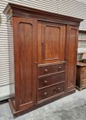 Victorian mahogany compactum with cavetto cornice, central cupboard with framed arch panel door,