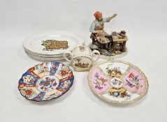 Grindley & Co set of five 'Beefeater' plates, oval, a Capodimonte-style figure of a gentleman