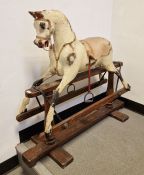 G. & J. Lines antique rocking horse on wooden base, dappled (in need of restoration). Height