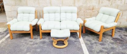 Ekornes Norwegian stressless mint green leather sofa, pair of matching armchairs and footstool