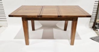 Modern hardwood extending dining table with panelled top, on square supports, 77cm high x 160cm long
