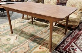 Mid century teak rectangular extending dining table by A H Mcintosh & co, opening to reveal metal