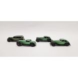 Four Dinky playworn diecast model cars to include 2 X No.36D Rover - dark green body, black