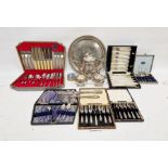 Loose flatware, fish servers, cased ware, a silver-plated three-piece teaset and a circular tray (