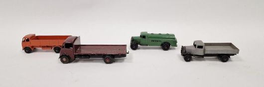 Four Dinky playworn diecast model cars to include No. 512 Guy flat truck - brown body, black