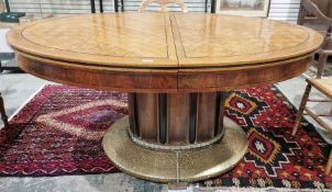 Austrian chequered oak oval dining table with ebony stringing, on oval curved panel column, hammered