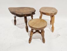 Two modern rustic sliced log stools and a similar stool/occasional table (3)