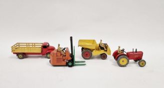 Four playworn Dinky diecast model cars to include No.27A Massey Harris tractor - red, tan driver,