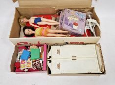 Three Sindy dolls (one missing a leg) together with a large collection of clothes, Sindy's own